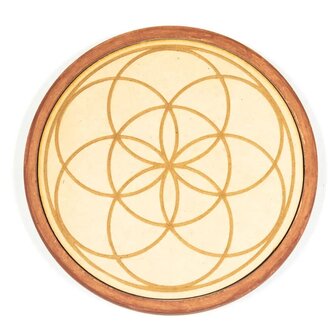 Bord met seed of life symbool als onderdeel van het kristalraster met als thema voorspoed