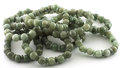 Jade bracelet , 10-11 mm beads with slices