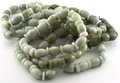 Jade bracelet , 10-11 mm olive-shaped beads
